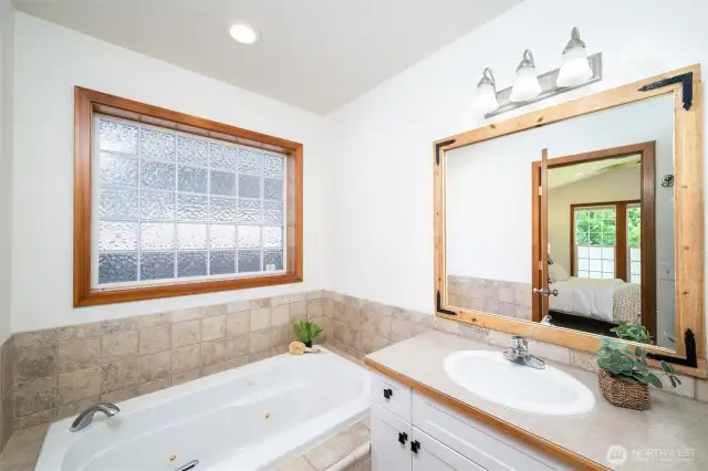 Unwind in the jetted soaking tub, enjoy the convenience of a separate walk-in shower.