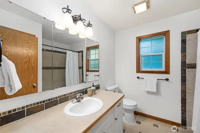 Tile floors, and plenty of vanity space to share.
