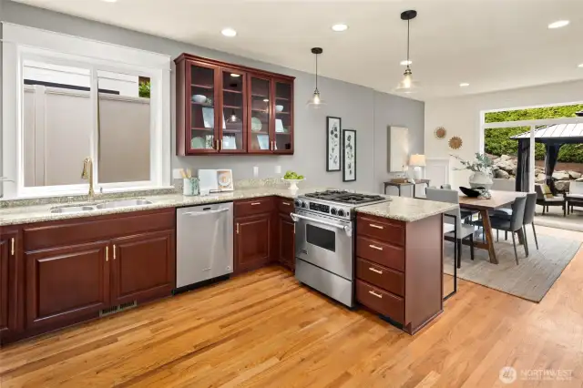 Serve up a home-cooked meal or your favorite takeout—this kitchen connects beautifully to the dining area and outdoor living beyond.