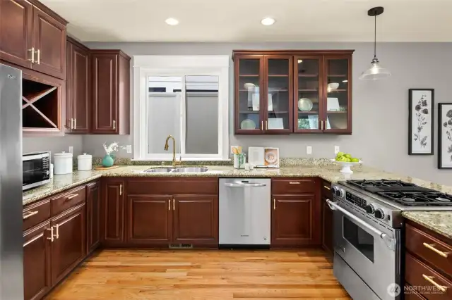 Framed by soft natural light, the kitchen blends form and function with a stylish nod to tradition.