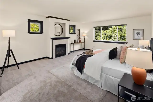 A peaceful, west-facing retreat with brand new carpet, freshly painted trim, and a cozy gas fireplace ready to wind down the day.