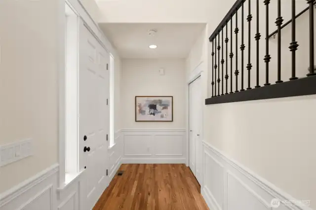 Step inside to a gracious entry featuring hardwood floors and newly painted millwork—setting the tone for the care and quality found throughout the home.