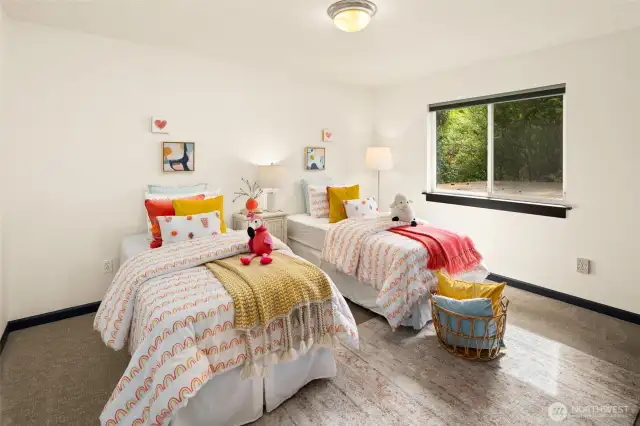 A cheerful and spacious bedroom - enjoy the ease and comfort of all four bedrooms on the same level!