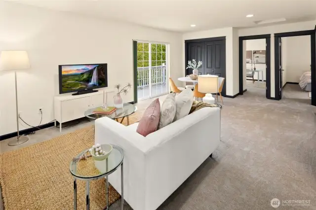 Whether you're hosting movie marathons, tackling homework at the table, or simply enjoying quiet time, this flexible upper-level hangout adapts to your every need.