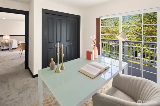 With a spacious closet and sliding doors to the balcony, this room can flex as a home office, guest bedroom, or creative studio.