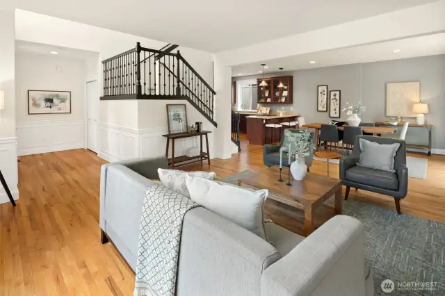 Gather around the fireplace or slide open the doors to the backyard patio and pergola —this versatile main level is designed for both cozy nights in and warm-weather entertaining.