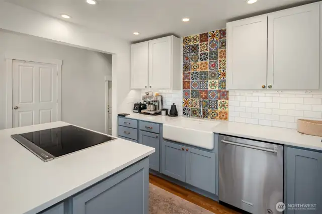 Newer luxury appliances. Induction stove. Double oven. Built-in microwave. Even an instant hot water dispenser!