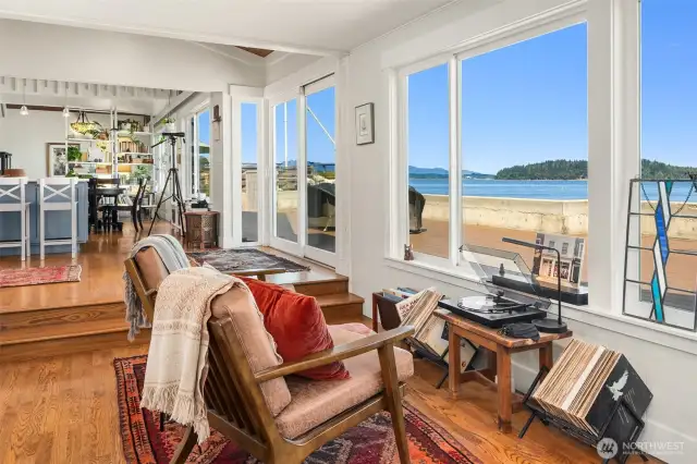The rooms in the lower level of this cozy home flow seamlessly from space to space...even from indoors to out.