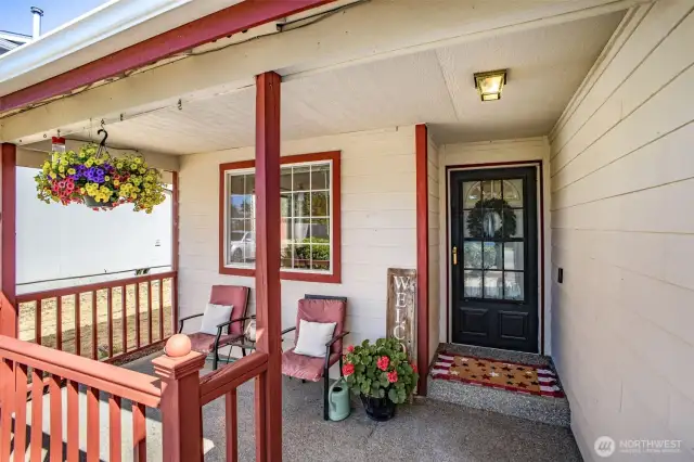 Covered front patio. Perfect for watching the sunset