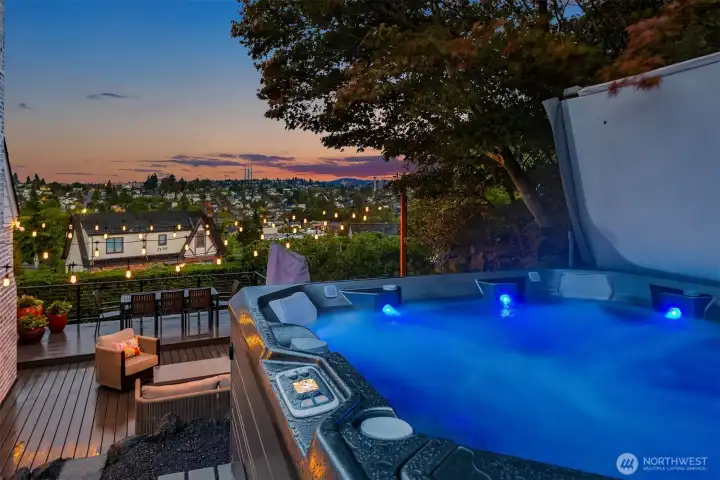 Retreat to your private saltwater hot tub. It's been used about 5 times and it stays!