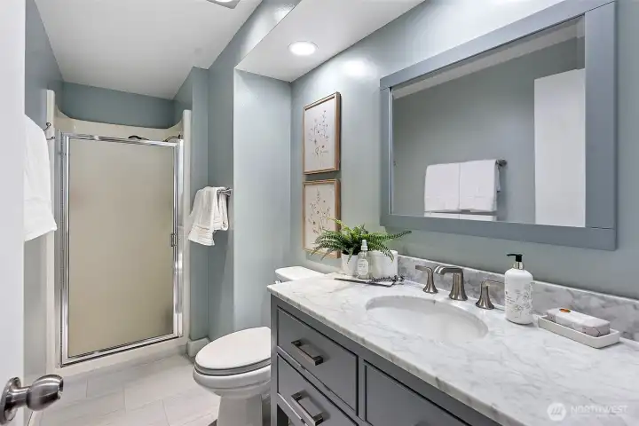 2 updated bathrooms - flooring, trim, paint and vanities.