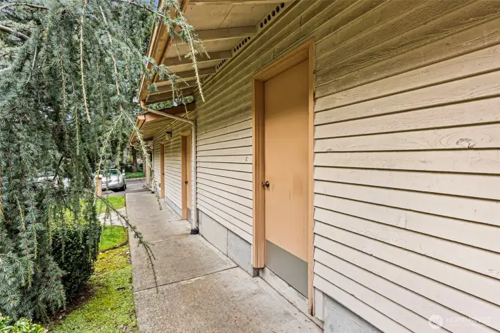 1-car garage across the entry courtyard