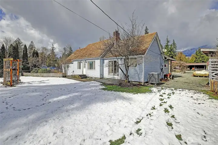 North side of home - fully fenced front yard