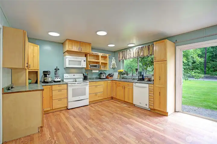 Kitchen with sliding door out to your front yard Kitchen with sliding door out to your front yard