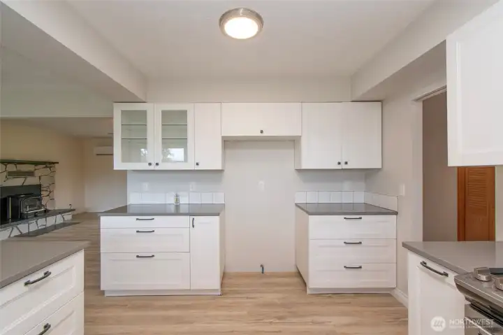 Nicely Updated Kitchen with Quartz Counters & New Floors