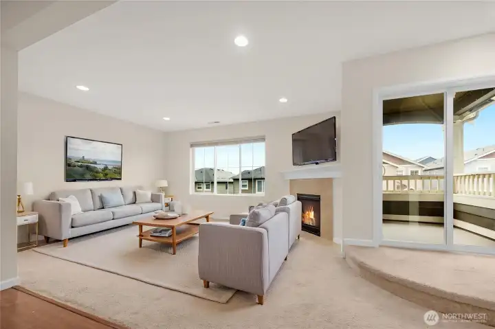 Living area with view and access to patio - Virtually staged