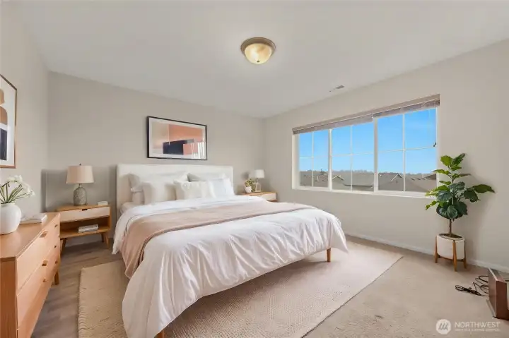 Primary bedroom with soaring views - Virtually staged