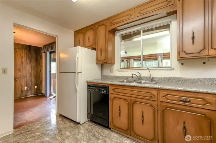 Kitchen with lot's of counter space, window adds natural light