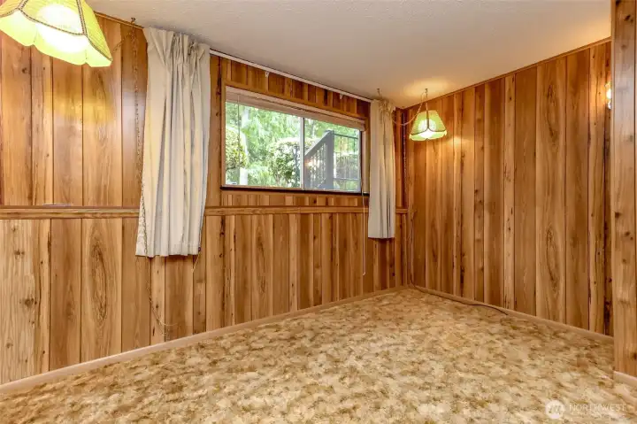 Downstairs extra room has closet for storage.