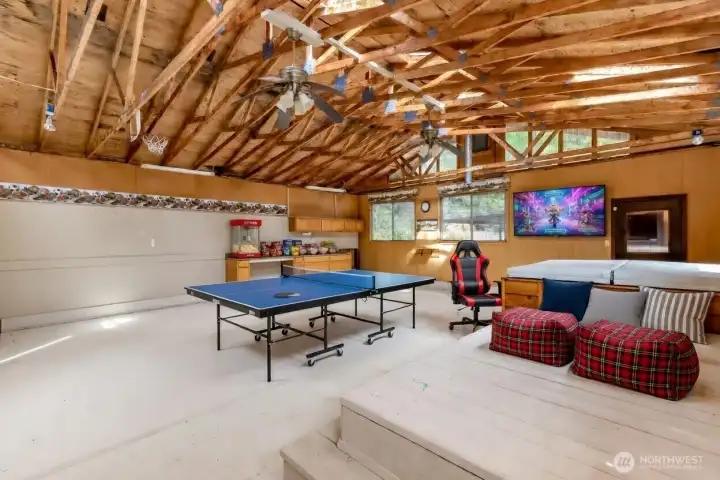 Outbuilding. Could be play room on rainy days, games, entertaining, and more.