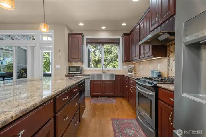 Exquisite cabinetry throughout spacious kitchen...