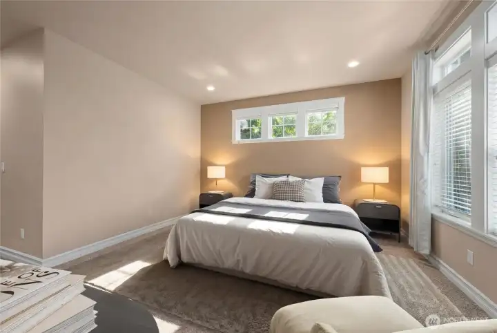 Primary bedroom, main level...  *virtually staged