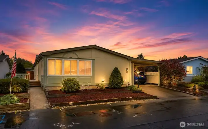 Beautifully maintained home, with excellent curb appeal, and inviting evening ambiance! #77 - A warm first impression both day and night