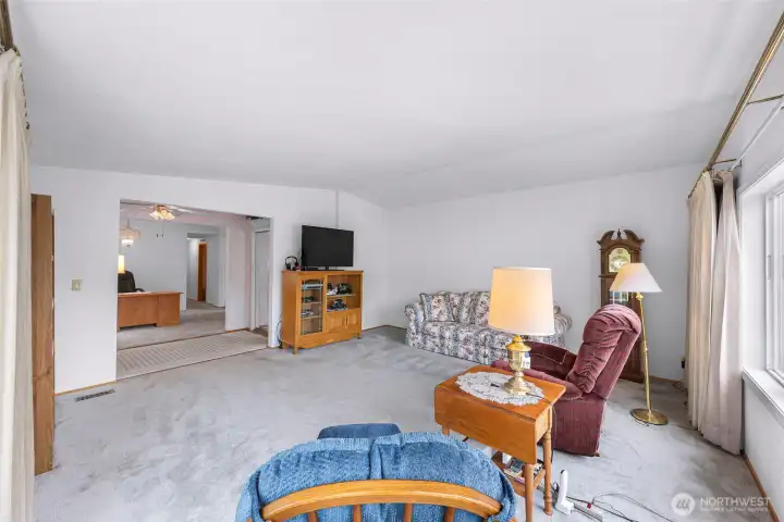 Easy flow to the adjoining entry and office or family room area