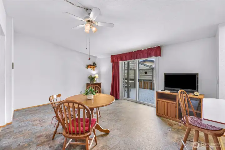 Flex space and/or dining space with no-step deck access & easy care durable flooring - It's HUGE!