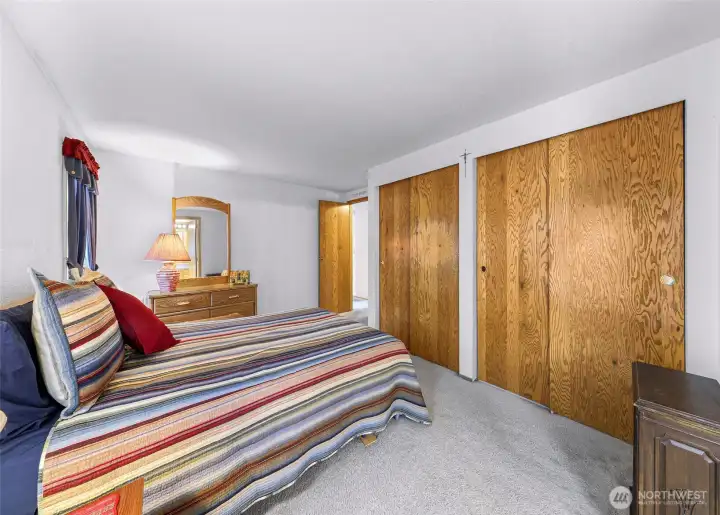 The primary suite has excellent closet storage, soft natural light, and plenty of room to create a peaceful retreat