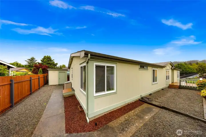 Nicely maintained exterior with attractive landscaping, easy-care grounds, and a desirable setting within the community