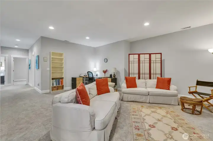 Lower Level Family Room adjoins to 3 additional bedrooms, Three Quarter Bath, Laundry Room and wonderful storage spaces - Perfect for entertaining!