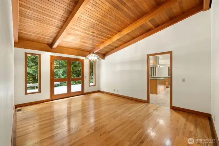 Natural Oak Finishes, Cabinetry and Wood Wrapped Windows Throughout.