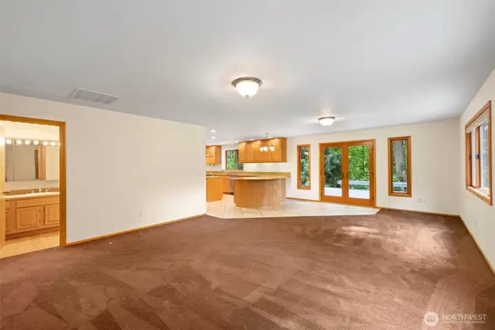 Great Room opens to Kitchen and back Deck.