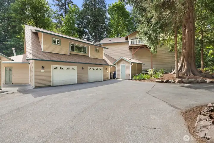 Apartment over 2 car garage.