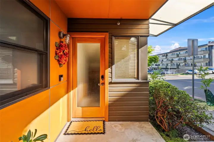 Covered front entry at street level