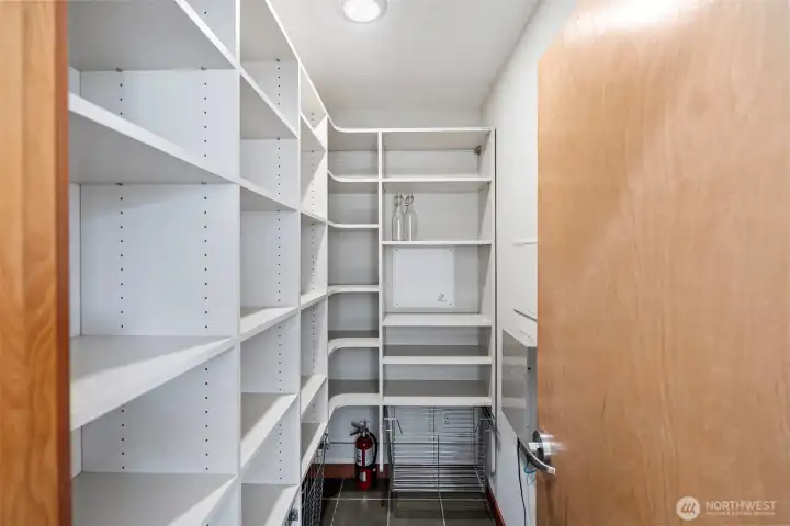 Additional pantry could be converted into a half bath or home office