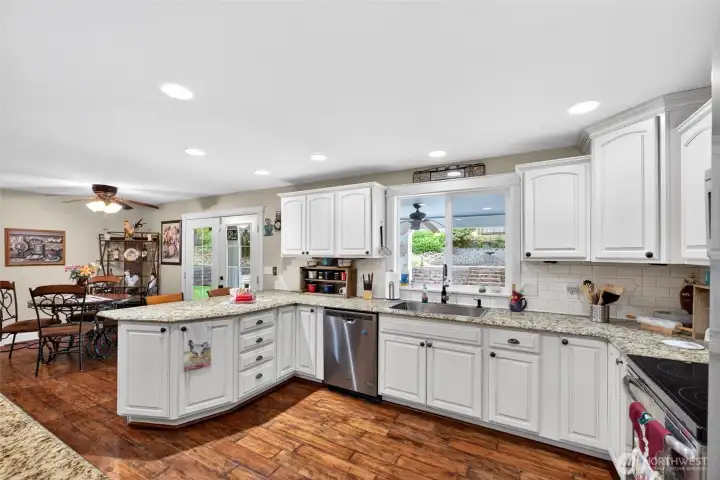 Huge kitchen lined with cabinets!