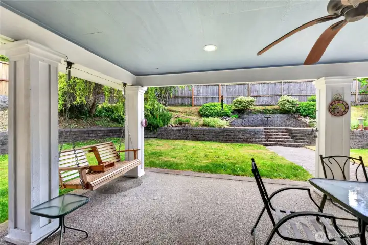Huge covered main porch and the swing conveys!