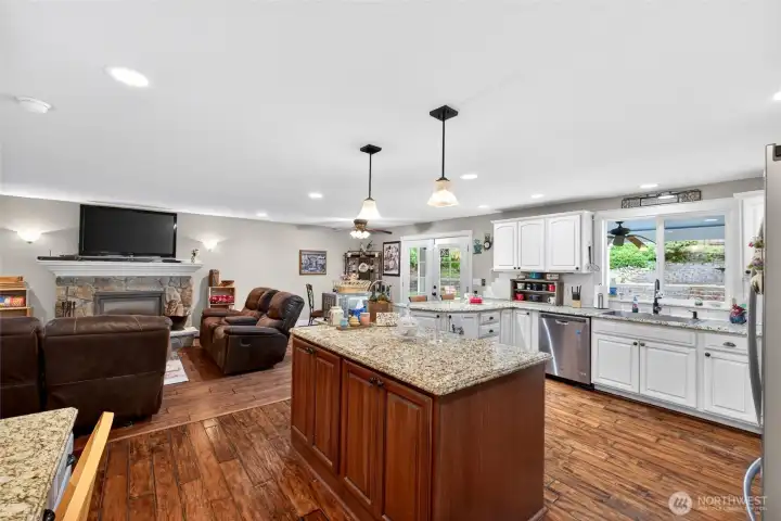 An island and (not seen in this photo) a wall of pantry storage  make this kitchen ideal for any chef