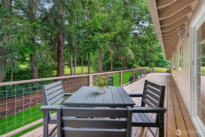 Enjoy BBQs and eating outside on the back deck, backing up to privacy with the trees.