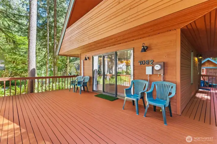 Expansive front deck provides the perfect setting for outdoor dining, entertaining, and relaxing in the mountain air.