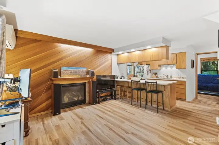 Spacious great room seamlessly connects the kitchen, dining, and living areas.