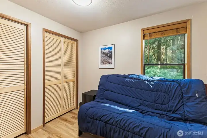 Main-level bedroom provides convenient single-level living accommodations.