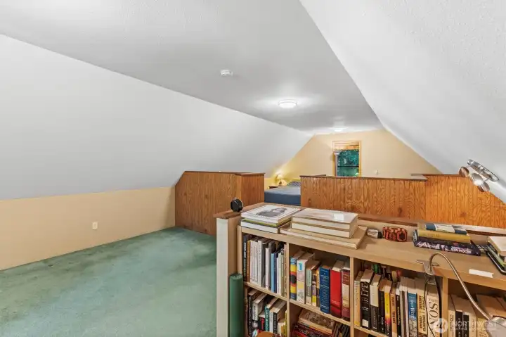 Upper-level flex space ideal for additional sleeping quarters, office, or recreation area.