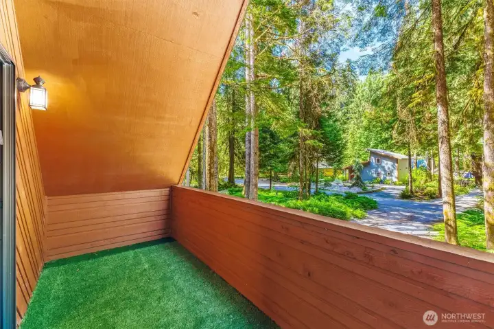 Upper deck creates a private perch for enjoying fresh mountain air and forest views.