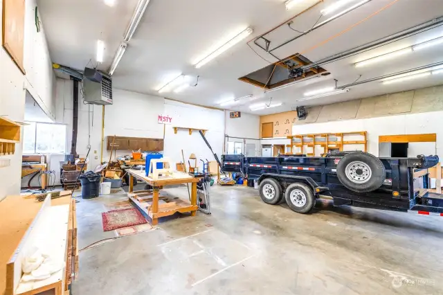 Main shop bay. Shop also includes office space and upper level storage.