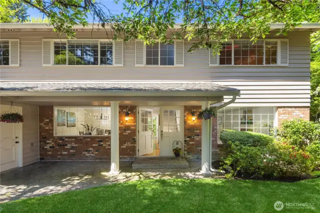Inviting entryway with timeless brick accents.
