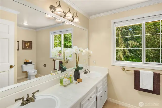 Large second floor bathroom with double sinks.