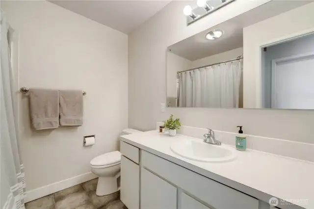 Full bathroom with shower/tub.